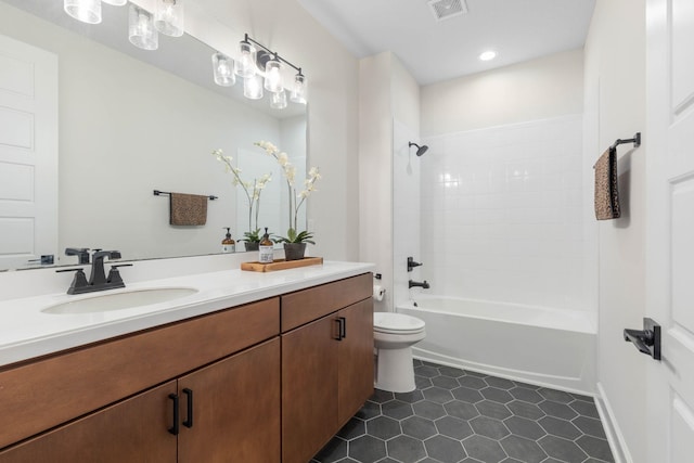 full bathroom featuring toilet, vanity, visible vents, shower / bathing tub combination, and tile patterned floors