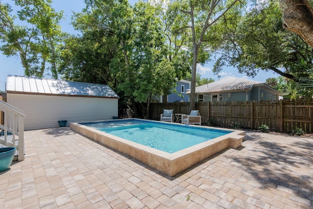 view of pool with a patio area