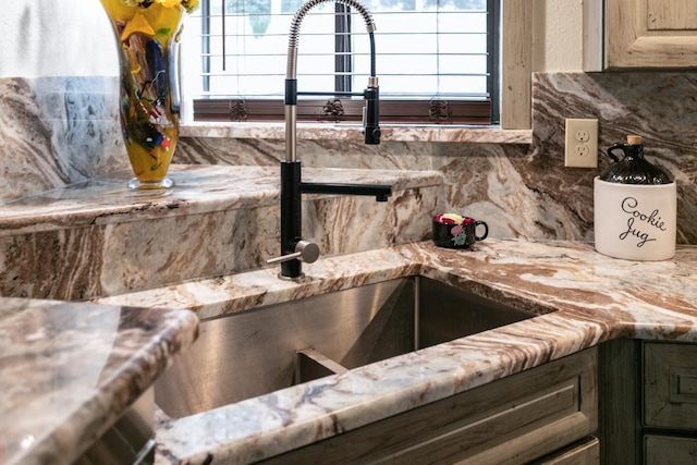 room details with decorative backsplash and sink