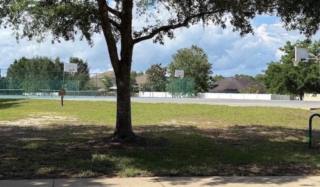 view of home's community with community basketball court