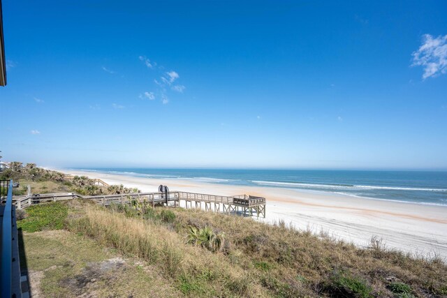 property view of water featuring a beach view