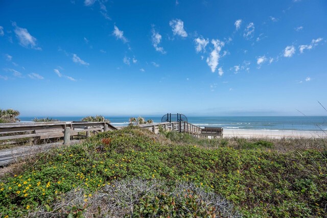 view of water feature with a beach view