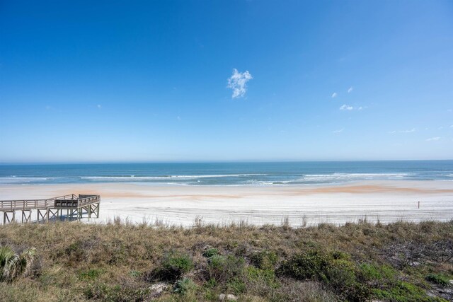 property view of water featuring a beach view