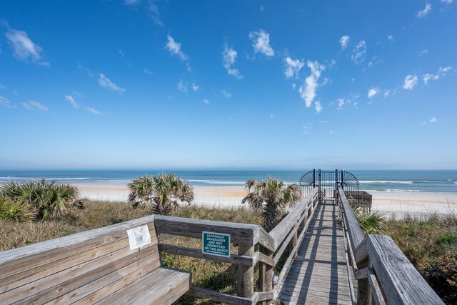 view of community featuring a view of the beach and a water view