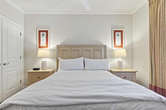 bedroom featuring ceiling fan and ornamental molding