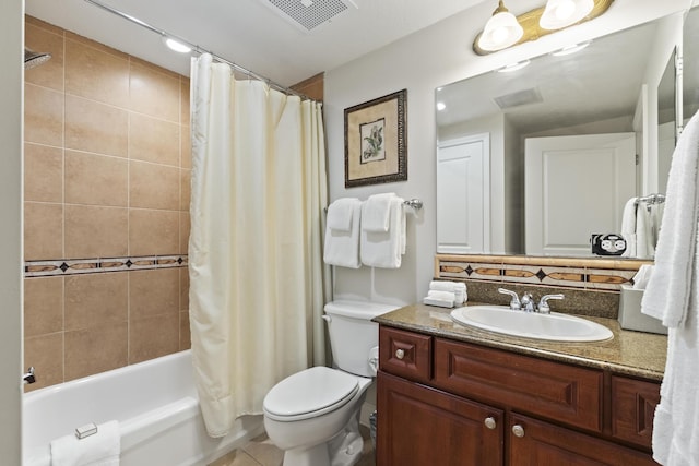 full bathroom featuring vanity, toilet, and shower / bathtub combination with curtain