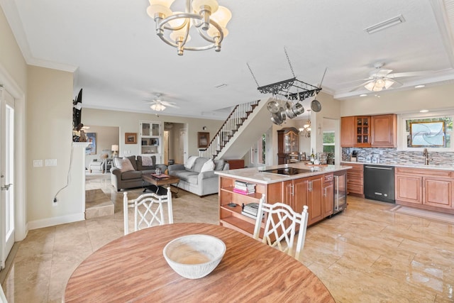 821 Kalli Creek Ln, Saint Augustine, FL 32080 - dining room with ceiling fan, a chandelier, stairs, crown molding, and beverage cooler