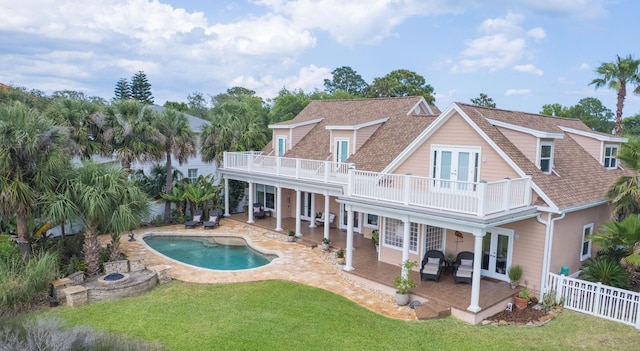 821 Kalli Creek Ln, Saint Augustine, FL 32080 - rear view of house with french doors, a balcony, and a patio area