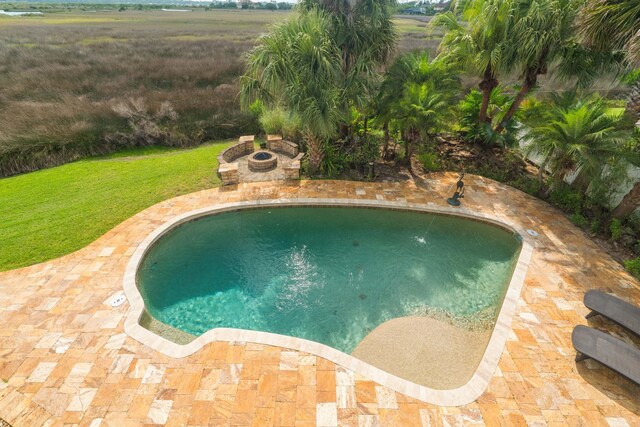 821 Kalli Creek Ln, Saint Augustine, FL 32080 - swimming pool with a lawn and a patio area