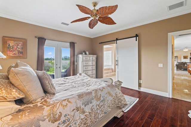 821 Kalli Creek Ln, Saint Augustine, FL 32080 - bedroom featuring french doors, access to exterior, a barn door, wood finished floors, and baseboards