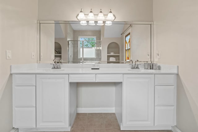 821 Kalli Creek Ln, Saint Augustine, FL 32080 - full bath with double vanity, a shower stall, baseboards, and tile patterned flooring