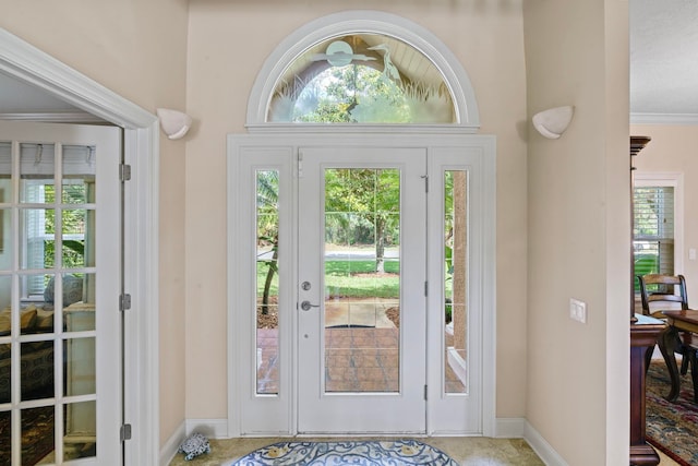 821 Kalli Creek Ln, Saint Augustine, FL 32080 - foyer with healthy amount of natural light, baseboards, and crown molding
