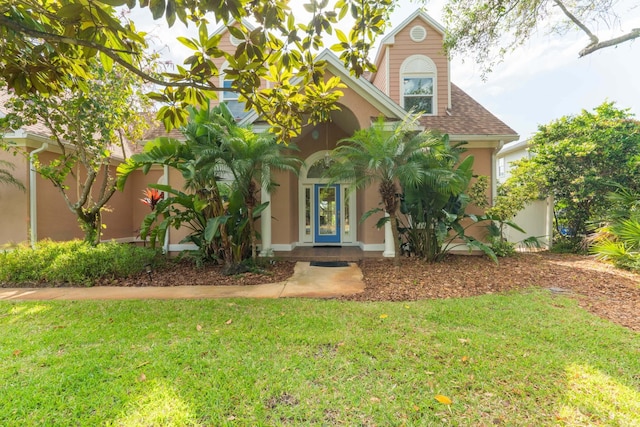 821 Kalli Creek Ln, Saint Augustine, FL 32080 - view of front facade featuring a front yard and stucco siding