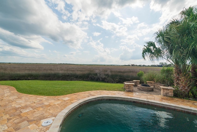 821 Kalli Creek Ln, Saint Augustine, FL 32080 - view of swimming pool featuring a fire pit, a lawn, and a patio area