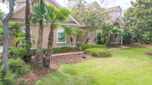 821 Kalli Creek Ln, Saint Augustine, FL 32080 - view of front of house with a front yard and stucco siding