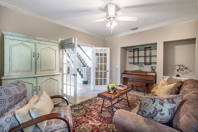 821 Kalli Creek Ln, Saint Augustine, FL 32080 - living area with a ceiling fan, crown molding, and stairway