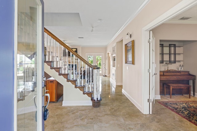 821 Kalli Creek Ln, Saint Augustine, FL 32080 - entryway with ornamental molding, baseboards, and stairway