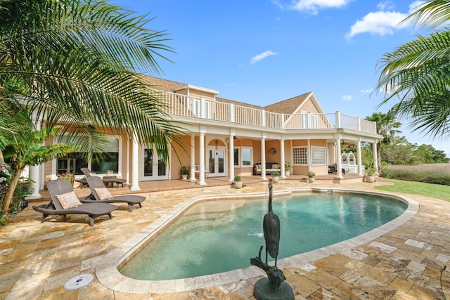 821 Kalli Creek Ln, Saint Augustine, FL 32080 - outdoor pool with french doors and a patio area