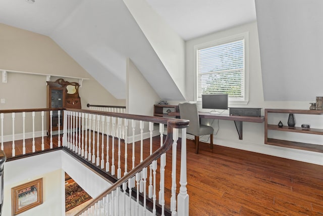 821 Kalli Creek Ln, Saint Augustine, FL 32080 - corridor featuring wood finished floors, lofted ceiling, an upstairs landing, and baseboards