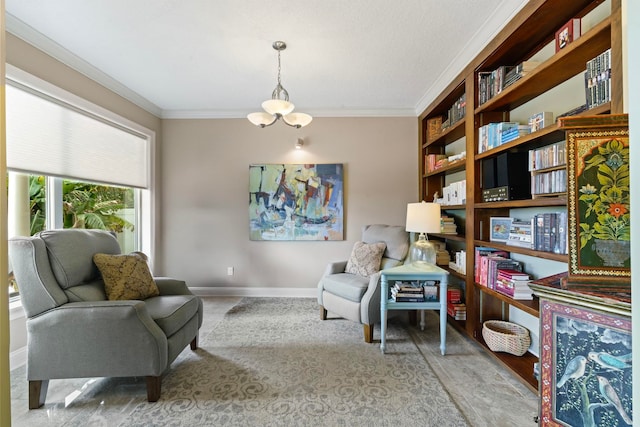 821 Kalli Creek Ln, Saint Augustine, FL 32080 - sitting room featuring crown molding, a chandelier, and baseboards