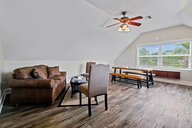 821 Kalli Creek Ln, Saint Augustine, FL 32080 - sitting room with wood finished floors, vaulted ceiling, a ceiling fan, and baseboards