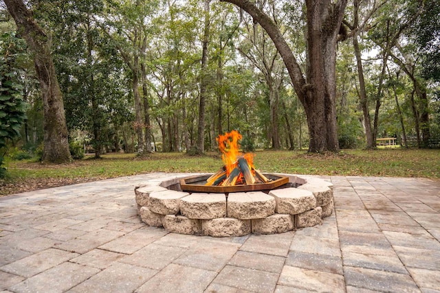 view of patio / terrace with a fire pit