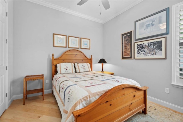587 Pescado Dr, Saint Augustine, FL 32095 - bedroom with light wood finished floors, crown molding, and a ceiling fan