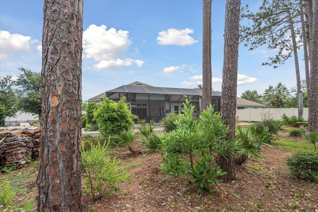587 Pescado Dr, Saint Augustine, FL 32095 - view of yard featuring a lanai