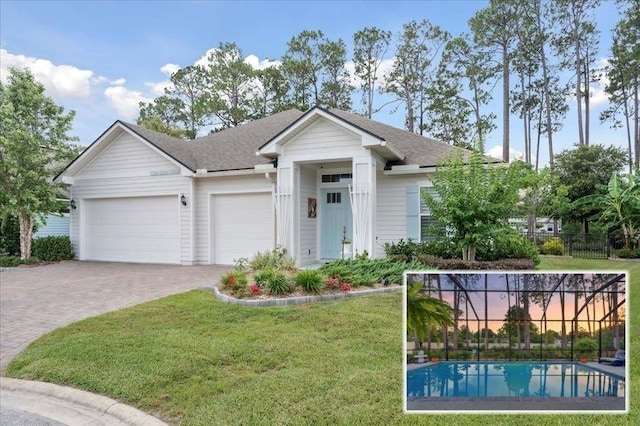 587 Pescado Dr, Saint Augustine, FL 32095 - single story home with a garage, driveway, and a shingled roof