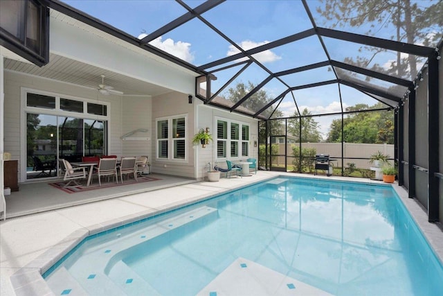 587 Pescado Dr, Saint Augustine, FL 32095 - view of swimming pool featuring a ceiling fan, a patio area, a grill, and a lanai