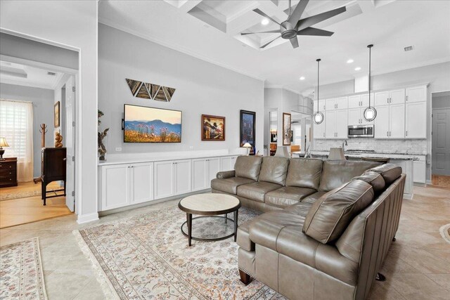 587 Pescado Dr, Saint Augustine, FL 32095 - living area featuring crown molding, ceiling fan, recessed lighting, coffered ceiling, and beamed ceiling