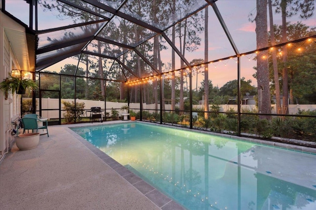 587 Pescado Dr, Saint Augustine, FL 32095 - view of pool featuring a fenced backyard, a patio, and glass enclosure