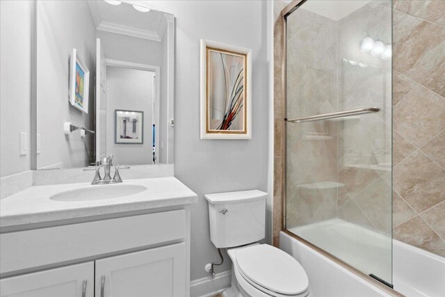 587 Pescado Dr, Saint Augustine, FL 32095 - bathroom featuring vanity, enclosed tub / shower combo, and ornamental molding