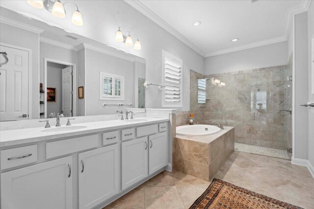 587 Pescado Dr, Saint Augustine, FL 32095 - bathroom with double vanity, a garden tub, a tile shower, ornamental molding, and tile patterned floors