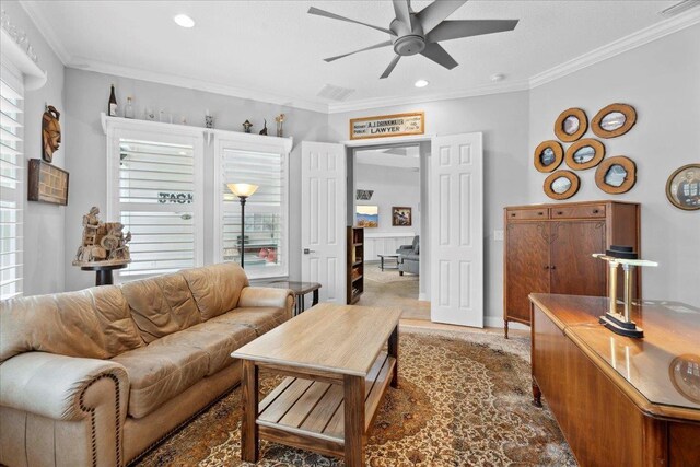 587 Pescado Dr, Saint Augustine, FL 32095 - living room featuring a ceiling fan, plenty of natural light, ornamental molding, and recessed lighting