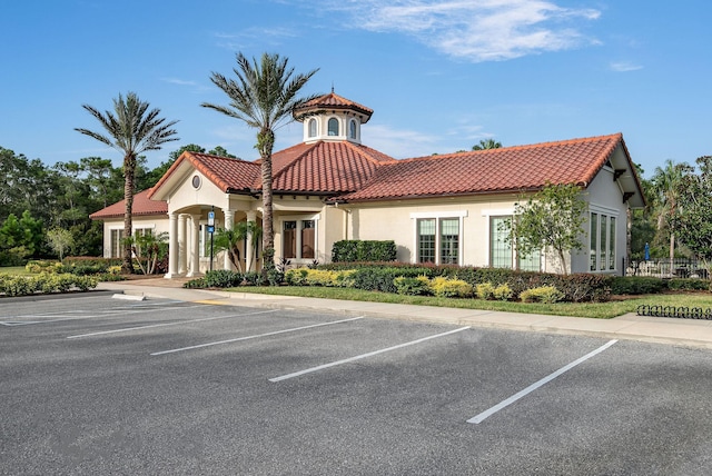 587 Pescado Dr, Saint Augustine, FL 32095 - view of building exterior with uncovered parking