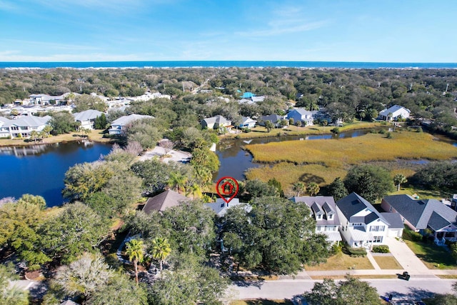 drone / aerial view with a water view