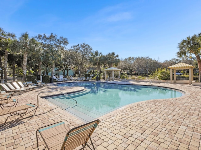 view of pool with a gazebo and a patio