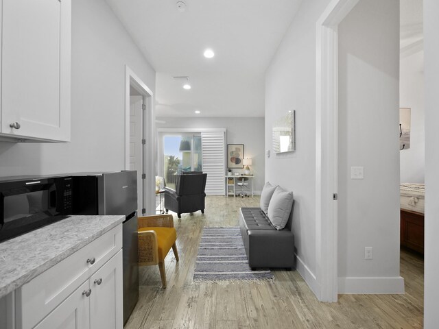 5813 Rudolph Ave, Saint Augustine, FL 32080 - sitting room with baseboards, light wood-style floors, and recessed lighting
