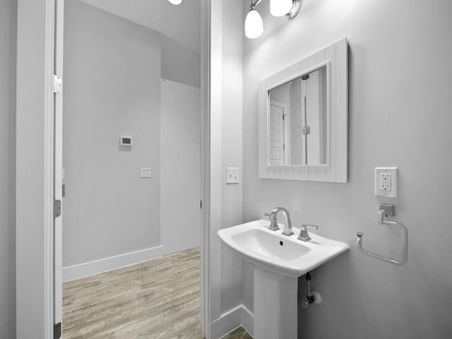 5813 Rudolph Ave, Saint Augustine, FL 32080 - bathroom with baseboards and wood finished floors