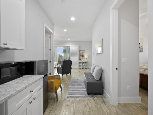 5813 Rudolph Ave, Saint Augustine, FL 32080 - sitting room featuring baseboards, light wood-style floors, and recessed lighting