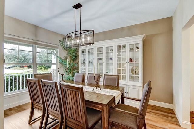 living room with hardwood / wood-style flooring and ceiling fan