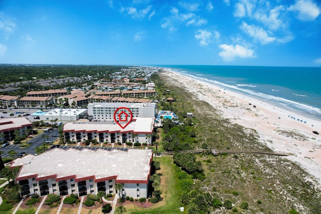 bird's eye view with a beach view and a water view