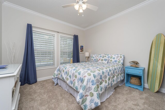 bedroom with ceiling fan, light colored carpet, and ornamental molding