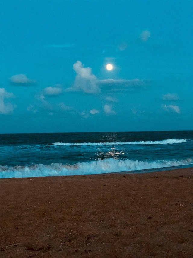 view of water feature with a view of the beach