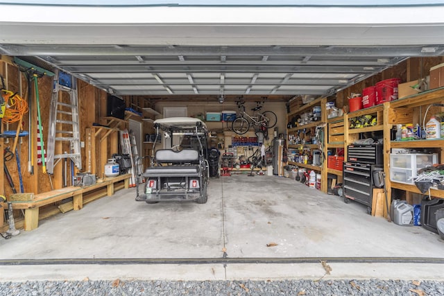 garage with a workshop area