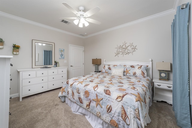 bedroom with light colored carpet, ceiling fan, and crown molding