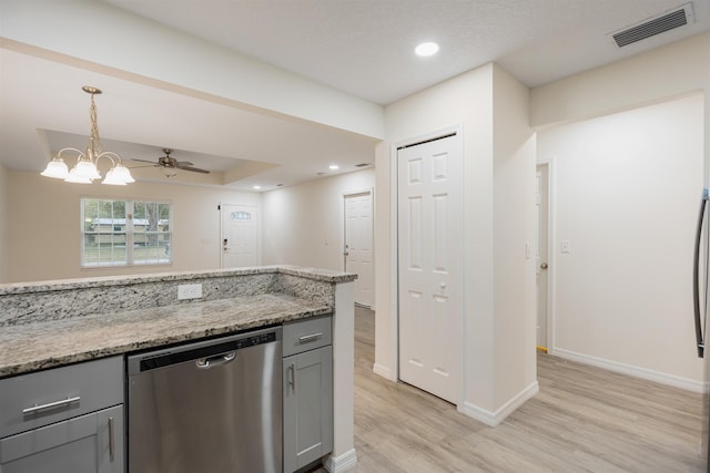 kitchen with light stone countertops, stainless steel dishwasher, light hardwood / wood-style floors, gray cabinets, and ceiling fan with notable chandelier