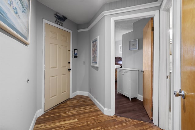 corridor with dark wood-type flooring