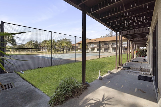 exterior space featuring tennis court